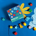 Jeu de perles en bois à enfiler Les toupitis - Moulin roty